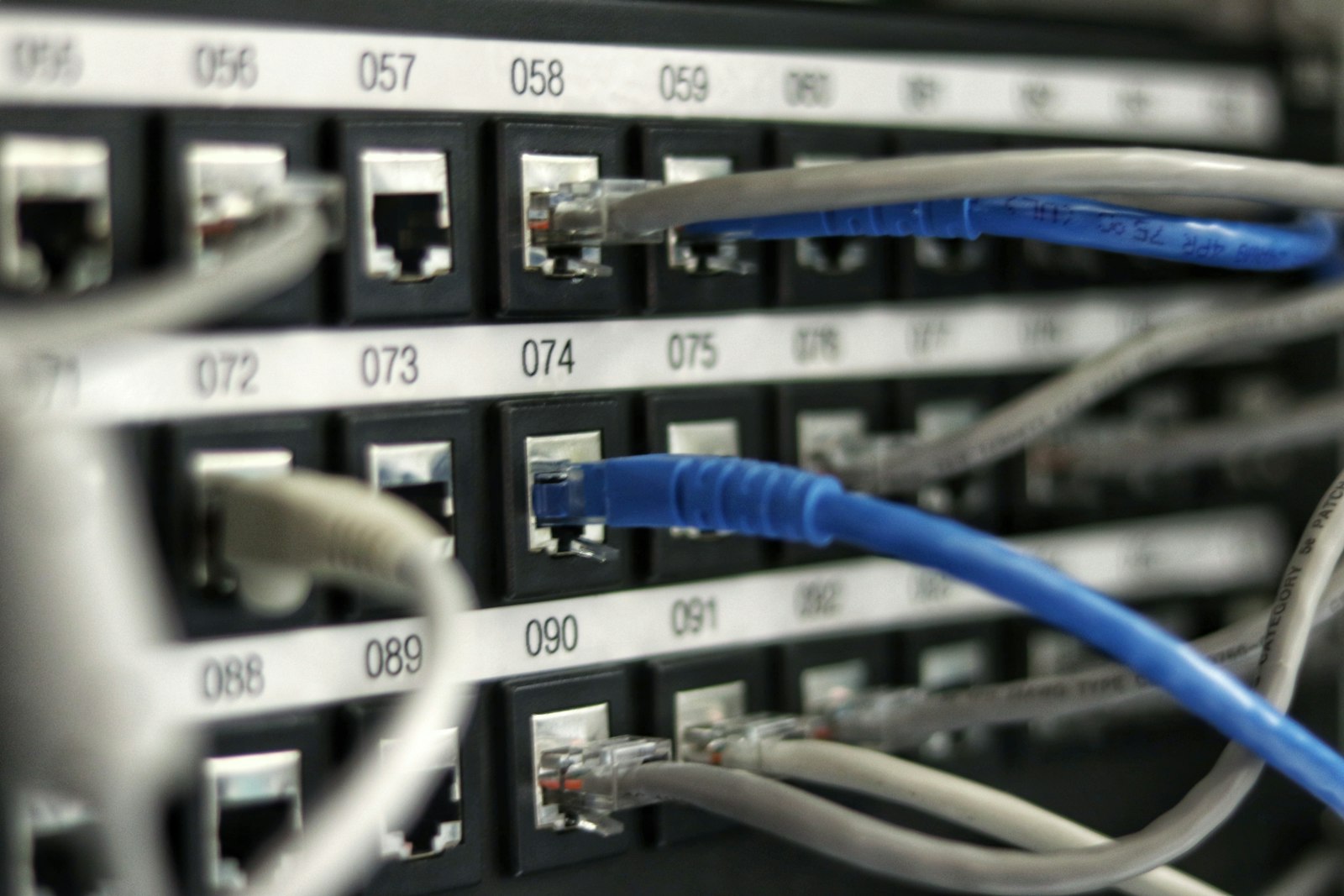 Rows of dark server racks with blue indicator lights, representing durable checkpoint storage